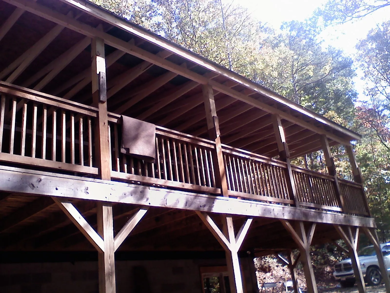 Timber framing under a new elevated porch and deck — Roof Leak Repair in North by Roofing Brothers